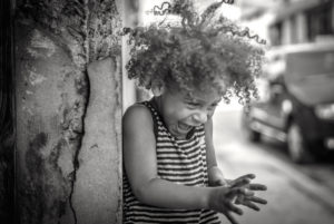Cuba, Havanna, little girl with curly hair, fun, happy, laughing, outside Cuba, Havanna, little girl with curly hair, fun, happy, laughing, outside